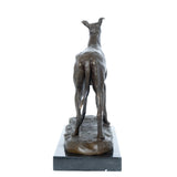 Rear view of bronze sighthound dog sculpture showing slim body proportions and long legs