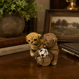 Bronze Pug puppy pair sculpture with soccer ball displayed as playful home, game room, and sports decor