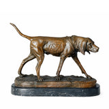 Handcrafted bronze hunting dog sculpture standing in an alert tracking pose