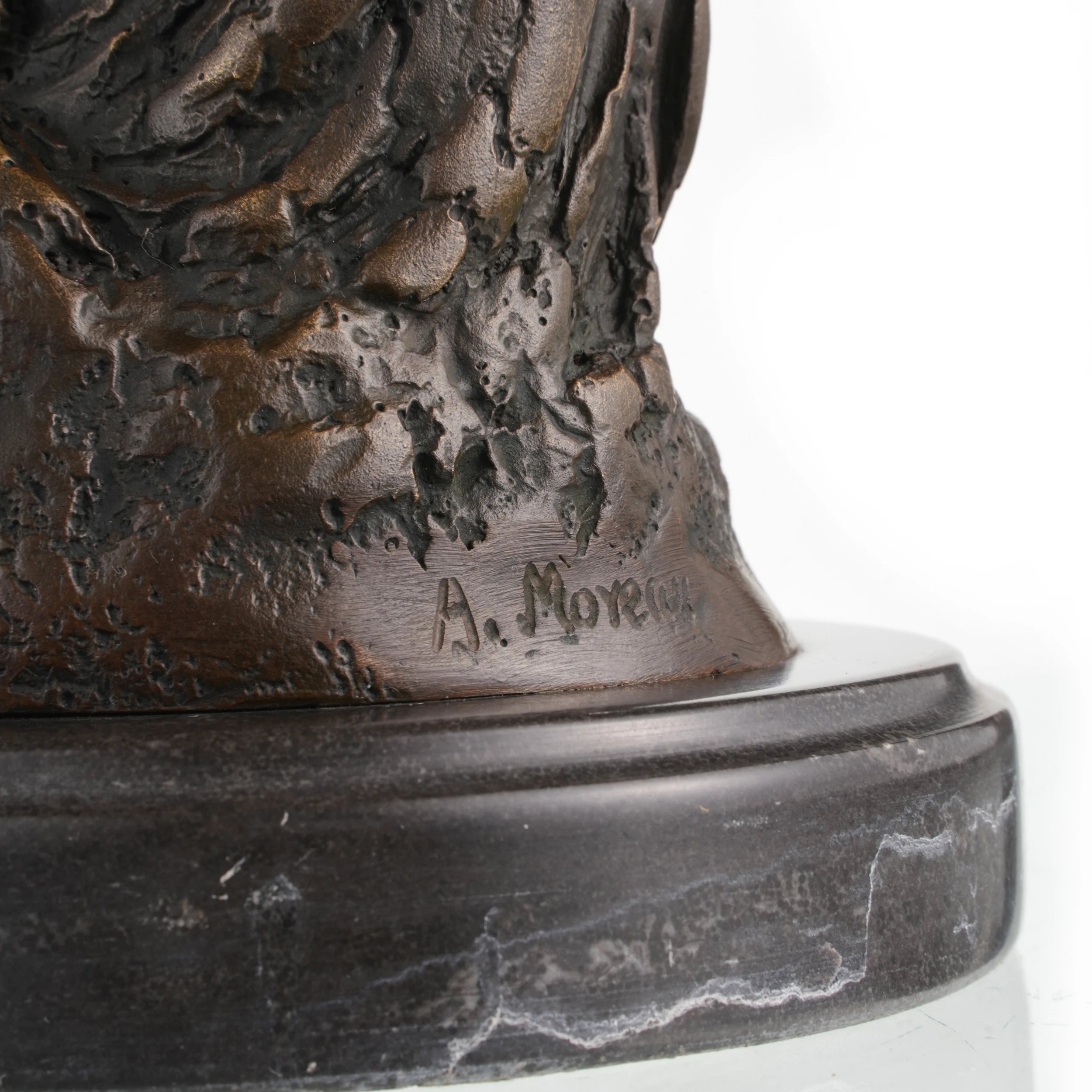 Bronze sculpture mounted on round marble base