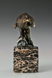 Pre-flight bronze eagle sculpture with detailed feathers and natural base. Elegant wildlife statue for home decor, office, or collectors.