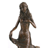 Floral maiden bronze sculpture girl holding flower nature inspired statue