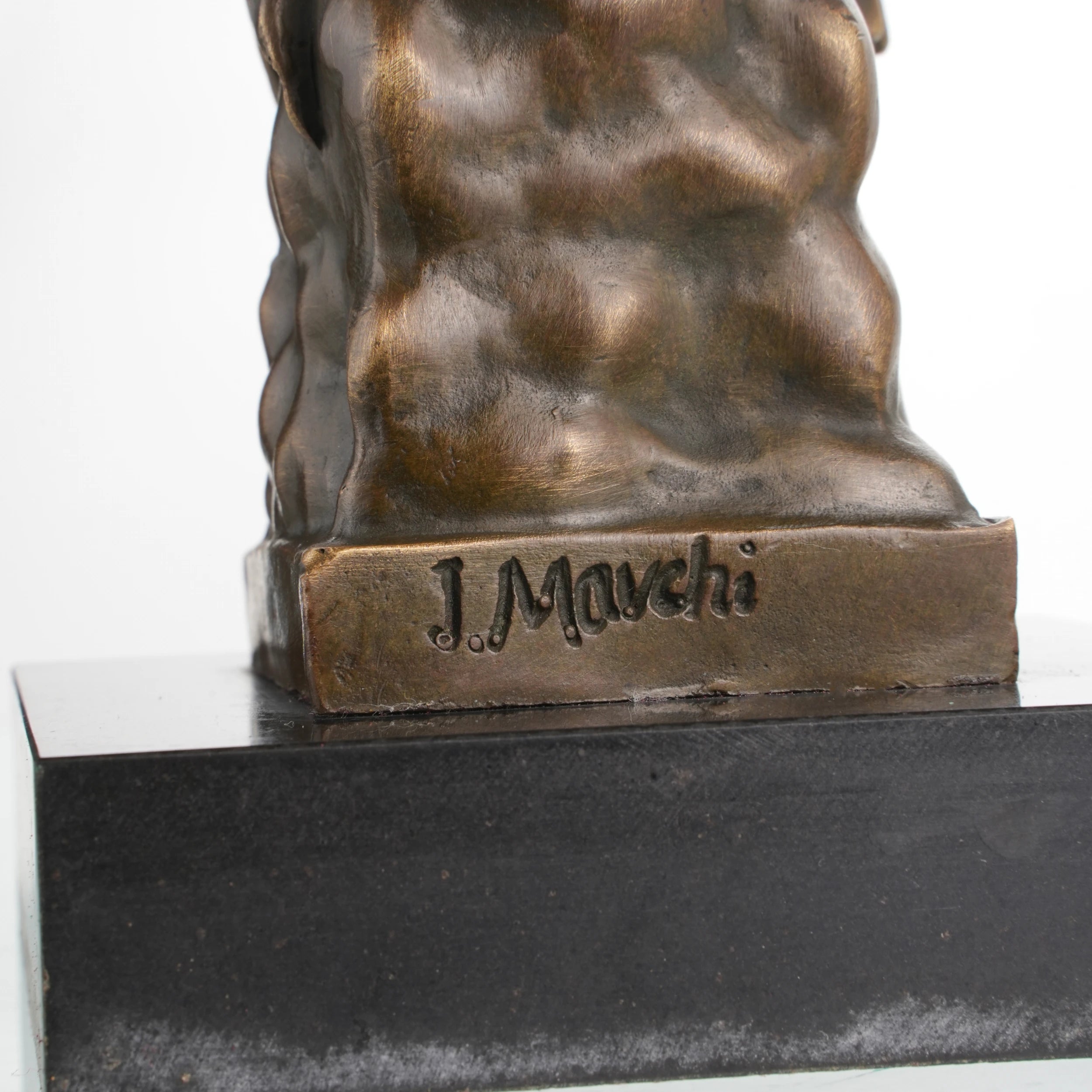 Bronze sculpture mounted on rectangular marble base