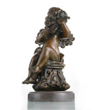 Charming bronze sculpture of a cherub playing mandolin, symbolizing music, innocence, and romance. A perfect decorative piece for homes and music lovers.
