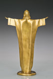 Rear view of Christ the Redeemer bronze sculpture showing the long robe and outstretched arms