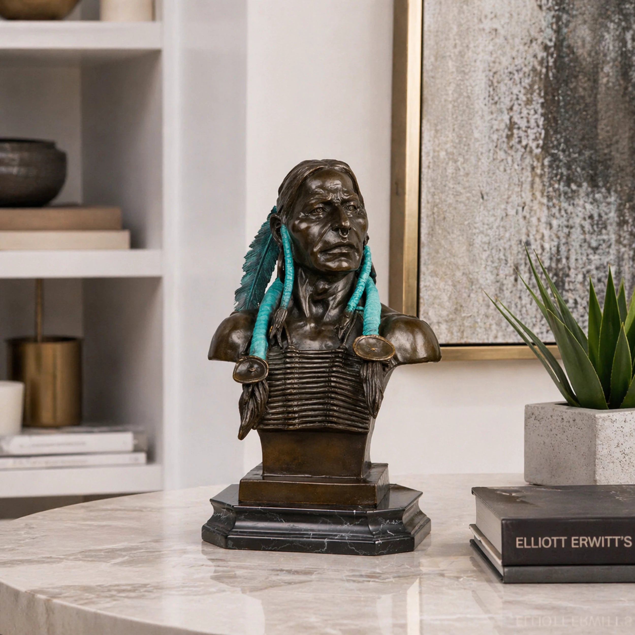 Bronze bust sculpture of a dignified male figure with traditional adornment