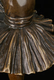 Detailed view of the pleated classical ballet tutu on the bronze ballerina sculpture