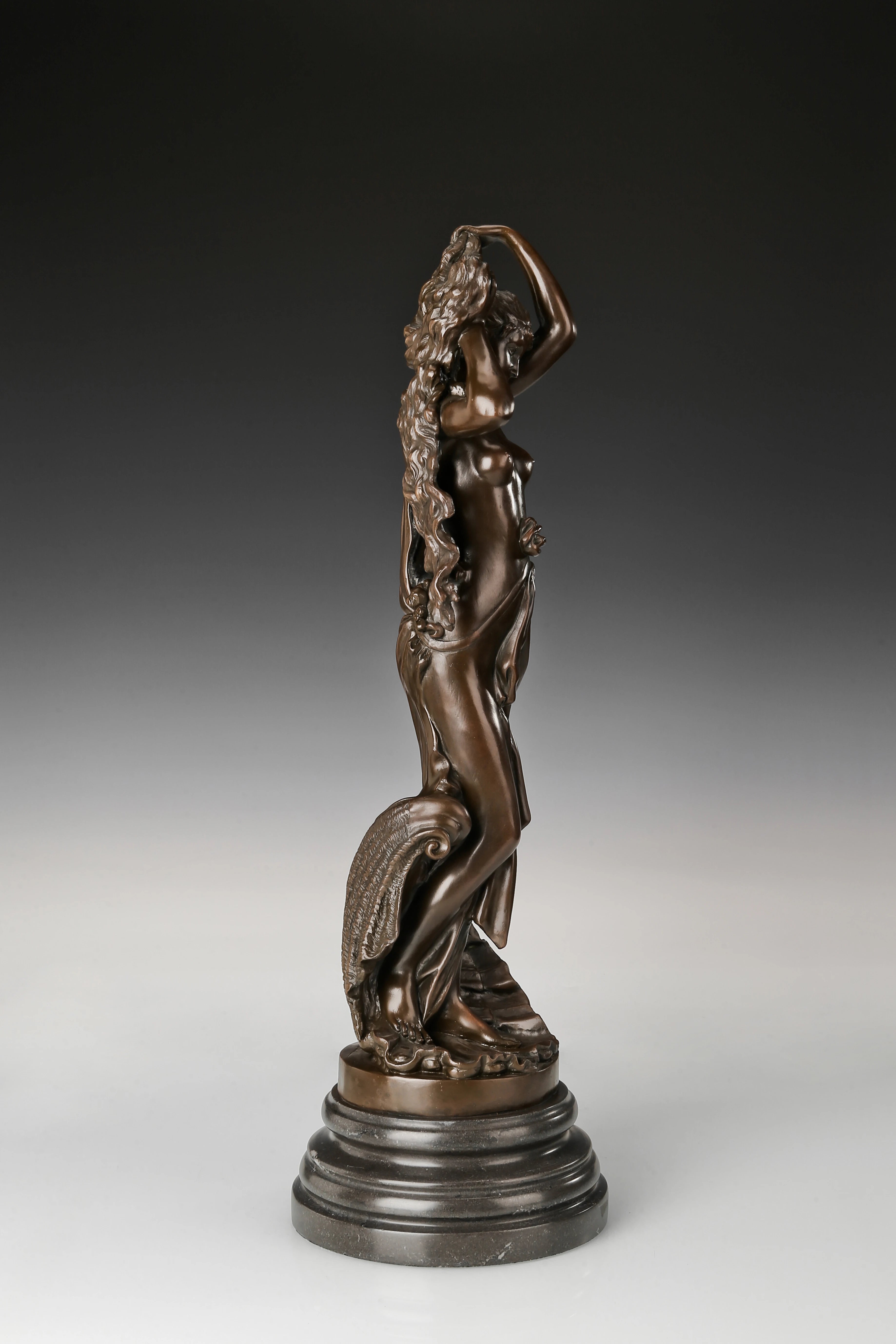 Right side view of handcrafted classical Venus statue with warm bronze patina
