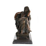 Stunning classical bronze sculpture of a seated muse in contemplative pensiero pose, goddess with flowing robes on claw-foot pedestal and black marble base, loss wax casting fine art.