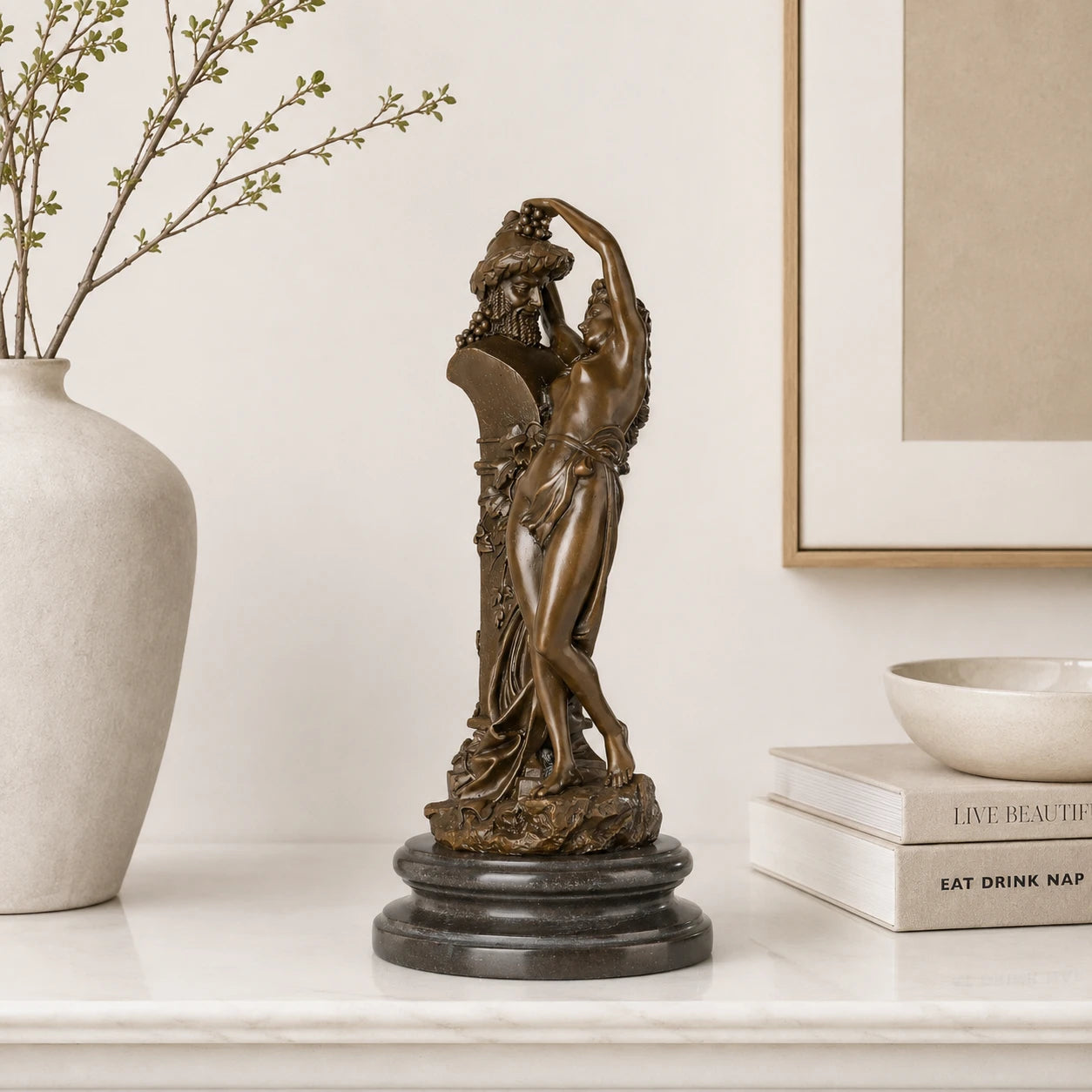 Dancing Women with Grapes Bronze Sculpture displayed in a styled interior
