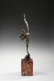 Mythic bronze eagle sculpture diving over waves. A powerful statement piece symbolizing strength, freedom, and mastery of the elements.