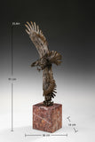 Mythic bronze eagle sculpture diving over waves. A powerful statement piece symbolizing strength, freedom, and mastery of the elements.