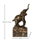 a dynamic bronze sculpture of an elephant calf, crafted using the lost-wax casting method and bearing the signature of the artist.
