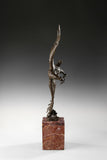 Bronze eagle sculpture over ocean waves with detailed feathers and marble base. Unique wildlife statue for home decor and collectors.
