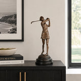 Female Golfer Follow-Through Bronze Sculpture displayed in a modern interior