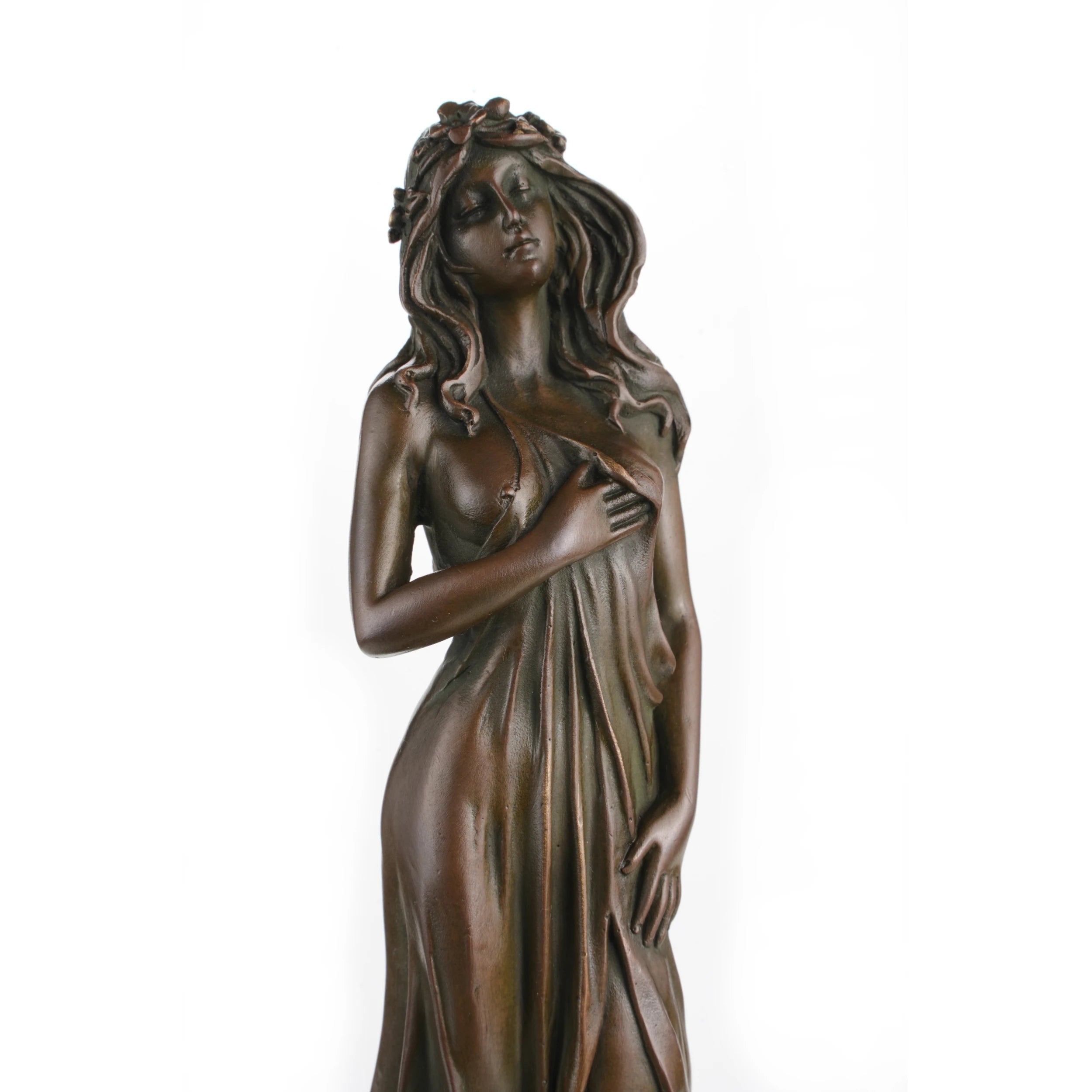 Floral hair detail of bronze maiden sculpture
