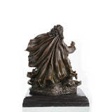 Flowing robes detail in religious bronze sculpture