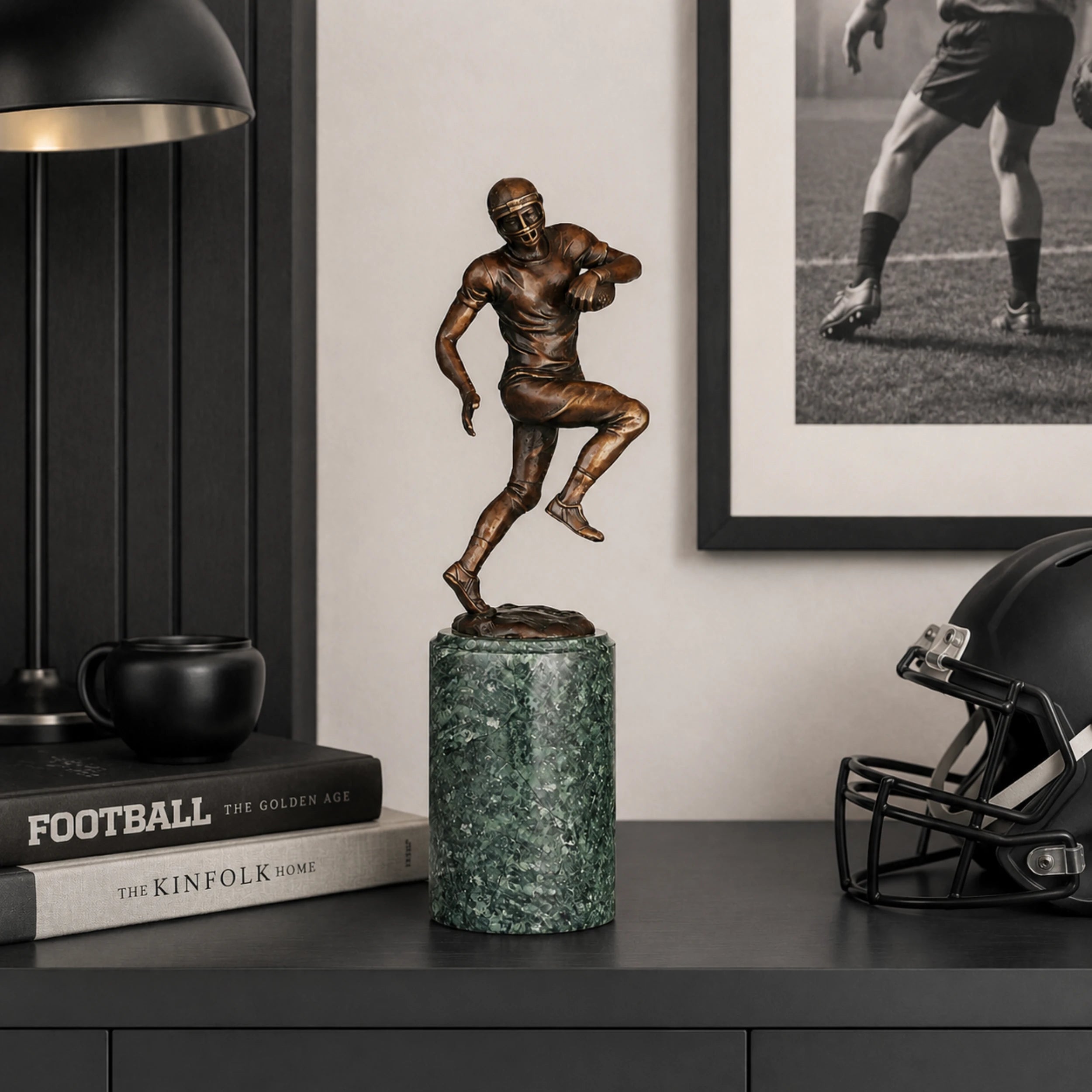 Football Player Bronze Sculpture displayed in a modern interior