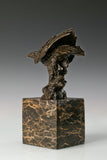 Bronze eagle sculpture ready to fly with wings partially spread and marble base. A powerful symbol of strength, freedom, and ambition.