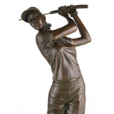 Close-up detail of a handcrafted bronze female golfer sculpture with hand-finished bronze patina and golf club.