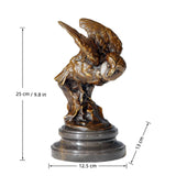 A bronze owl statue capturing the powerful moment of flight. Detailed feather textures and a black marble base make this wildlife statue perfect for home or office decor.