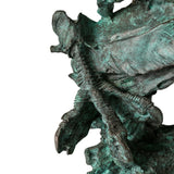 Abstract bronze eagle head sculpture with striking verdigris patina and marble base. A bold wildlife statue symbolizing freedom, strength, and vision.
