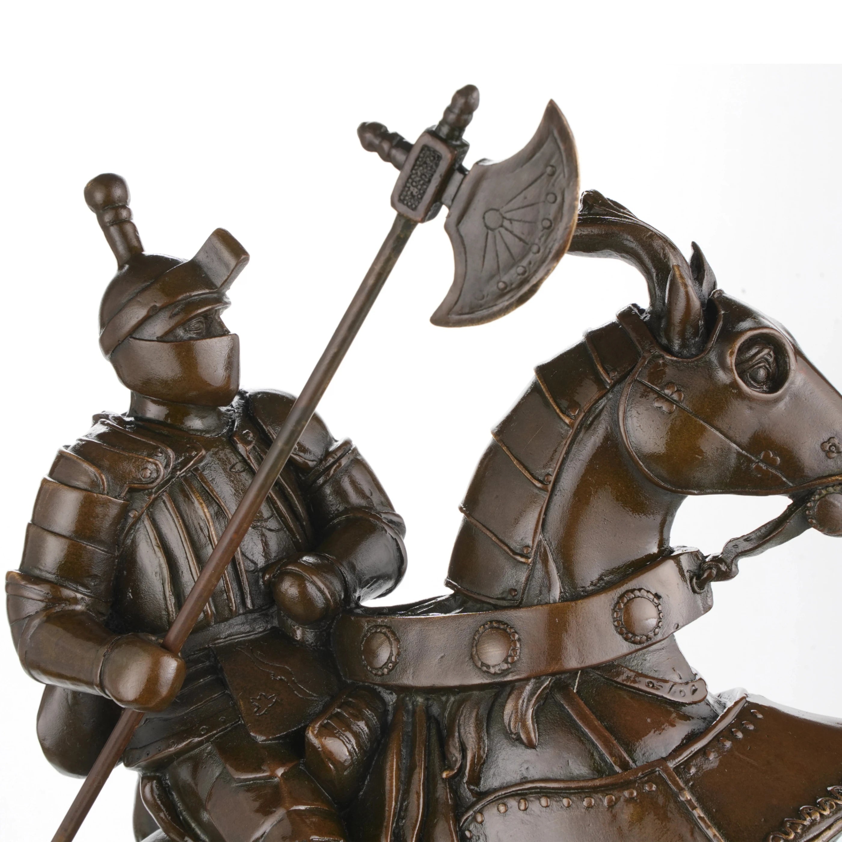 Bronze sculpture of a medieval knight on a rearing horse in full armor. A powerful equestrian statue symbolizing strength, honor, and chivalry.
