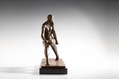 End view of abstract bronze woman sculpture showing the narrow rectangular pedestal