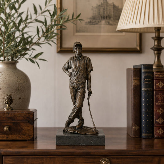 Male Golfer bronze sculpture displayed in a refined interior setting