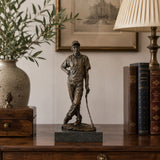 Male Golfer bronze sculpture displayed in a refined interior setting