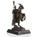 Medieval knight in plate armor on rearing horse bronze sculpture, detailed horse barding and armor statue on black marble base, loss wax casting historical art.
