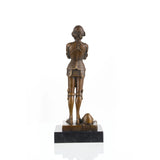 Side view of medieval warrior sculpture