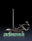 Right side view of modern bronze sailboat sculpture with streamlined artistic design