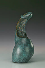 Side profile of modern female torso sculpture with green patina
