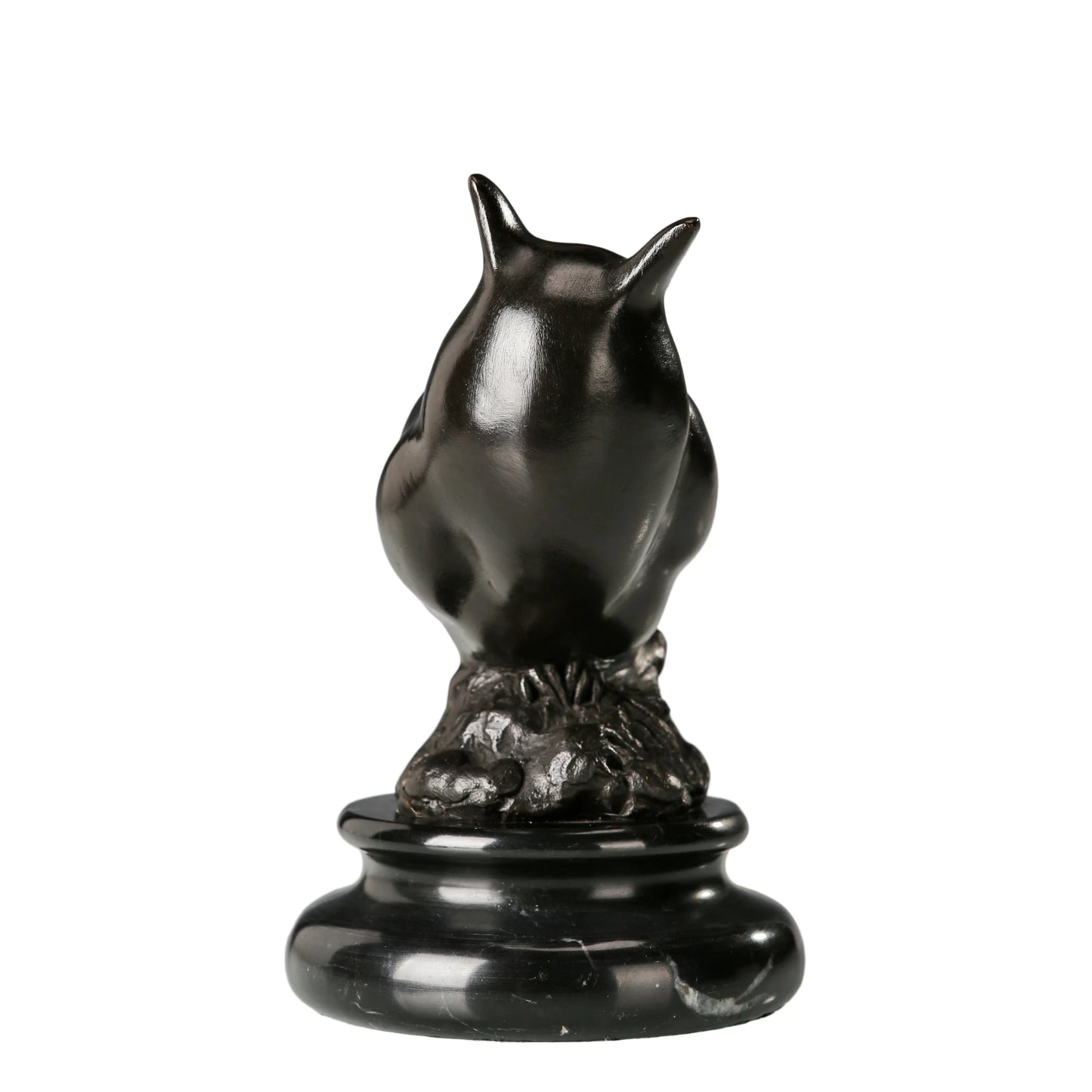 a modern abstract bronze owl sculpture with smooth minimalist lines and a black marble base. A stylish symbol of wisdom, perfect for contemporary home or office decor.