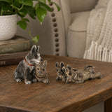 Painted bronze hunting dog pack sculpture displayed as distinctive hunting lodge and country home decor
