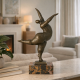 plump dancer bronze statue