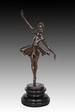 Side view of classical bronze ballet dancer statue in a graceful dance pose