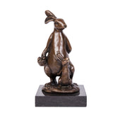 Rabbit Holding Acorn Bronze Sculpture on a clean white background