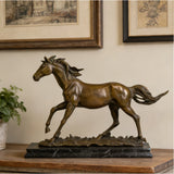 Dynamic galloping bronze horse sculpture with flowing mane and tail, realistic running horse statue on veined black marble base, loss wax casting fine art.