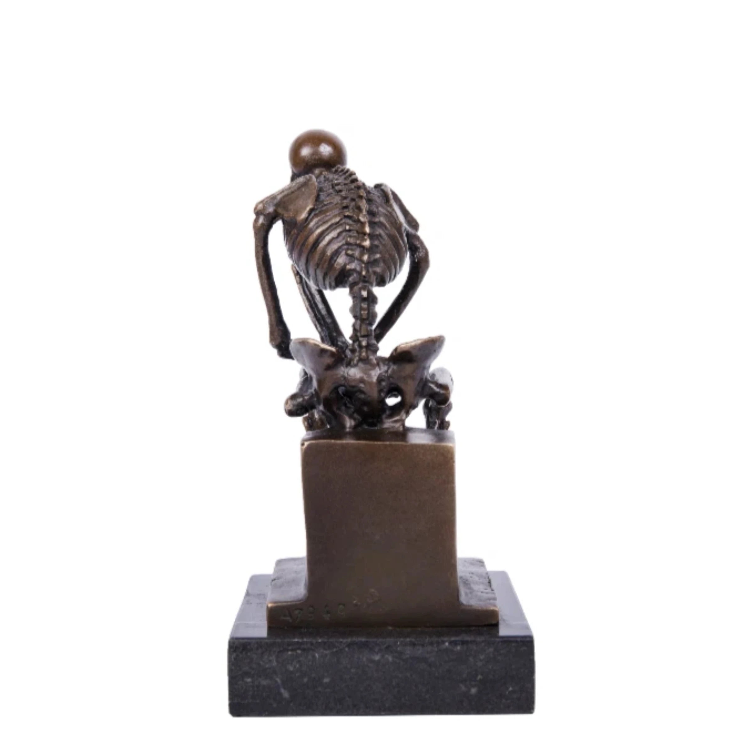 thinking pose skull statue
