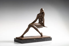 Front view of thoughtful seated woman bronze sculpture with tilted head and textured finish