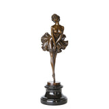 Vintage ballerina bronze sculpture with a flared tutu and graceful pointe pose