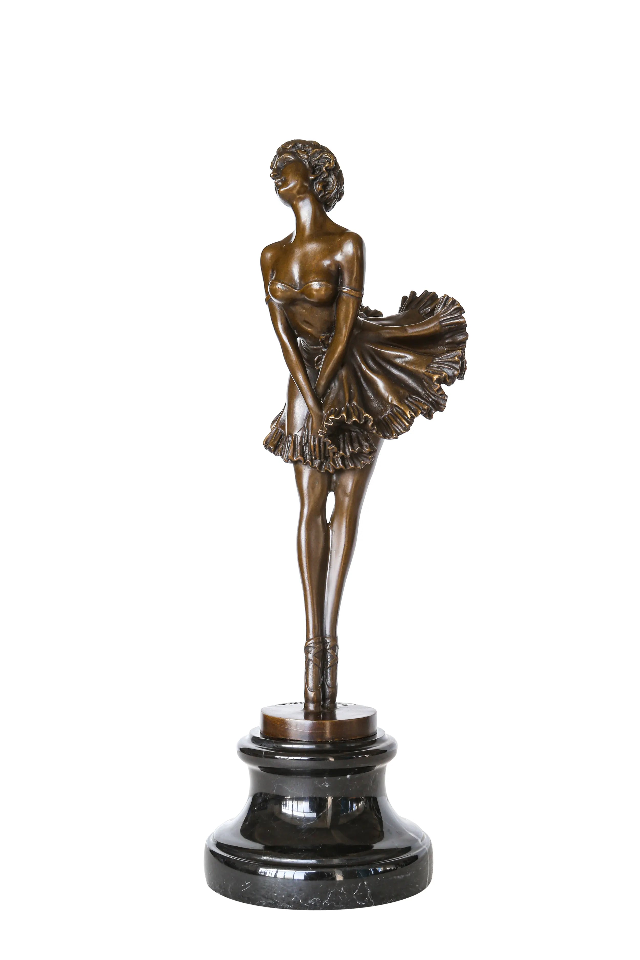 Three-quarter view of vintage bronze ballerina figurine with a gently tilted head