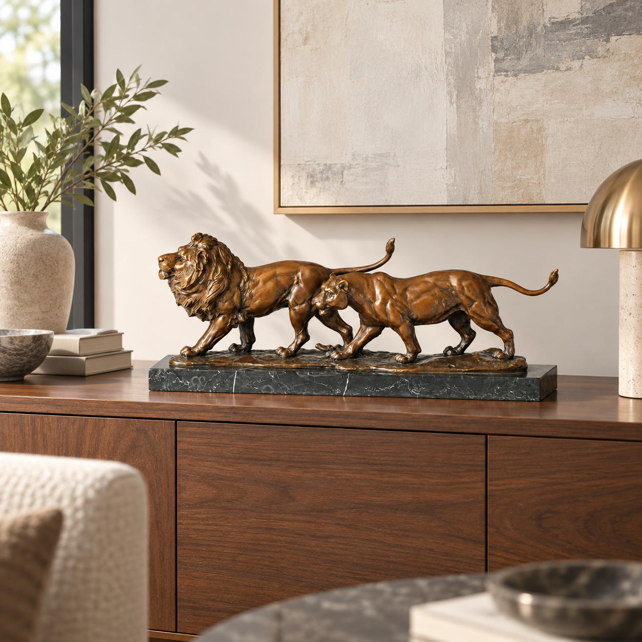 Walking Lion Couple Bronze Statue displayed in a minimalist interior