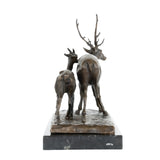 Back view of handcrafted walking stag and doe bronze sculpture