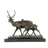 Left side view of walking stag and doe bronze statue