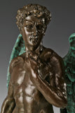 Close-up detail of handcrafted bronze male figure sculpture