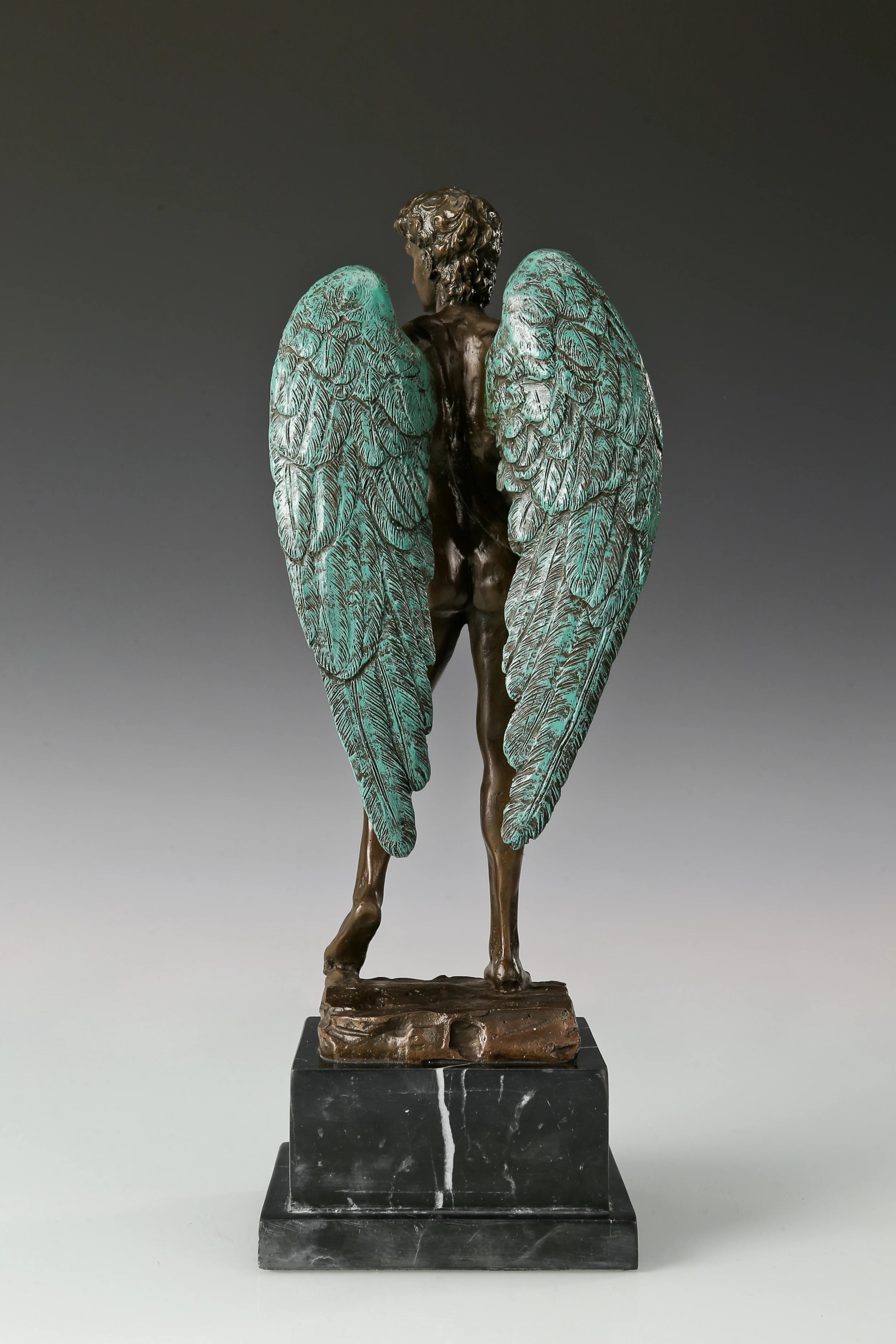 Back view of Winged David sculpture with feathered bronze wings