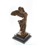 Bronze Winged Victory of Samothrace statue on marble base